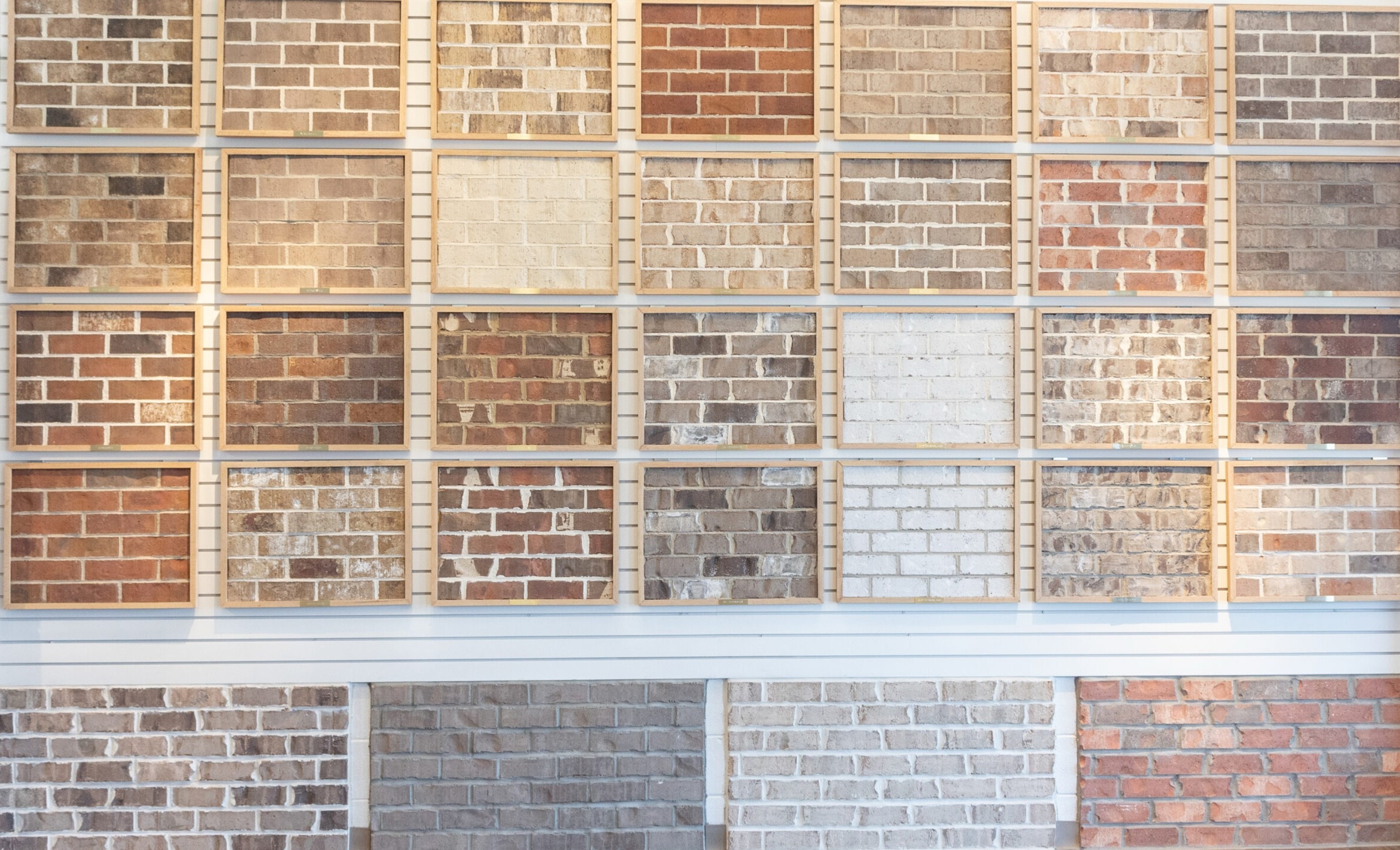 Stack of red bricks showing texture and color variation